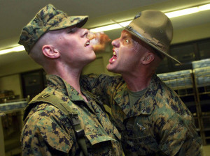 United States Marine Corps drill instructor yells at a recruit after ...