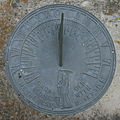 This sundial displays a likeness of Father Time . Its motto quotes ...