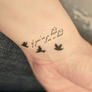 Cute little black bird tattoo!