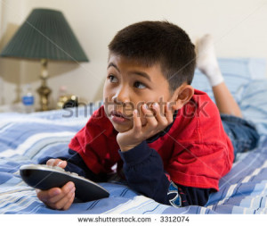 stock-photo-young-asian-boy-laying-down-on-his-stomach-on-the-bed ...