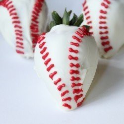 White chocolate covered strawberries in baseball design