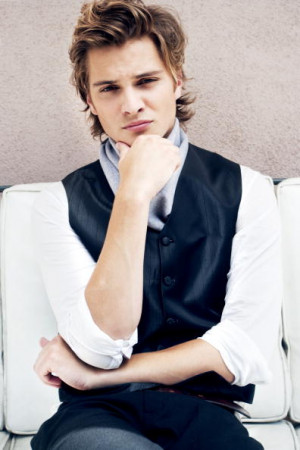 Luke Grimes as Elliot Grey