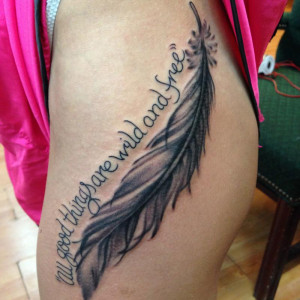 Quotes Done On The Left Thigh In Black And Grey Benchmark Tattoo