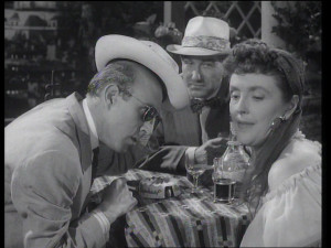 ... become involved with shifty Lionel Jeffries and sneaky Joyce Grenfell