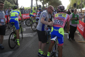 Alberto Contador (Tinkoff-Saxo) gets assistance after crossing the ...