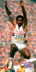 DALEY THOMPSON executing his long jump en route to successfully ...