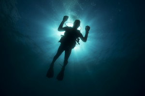 US Navy Divers Conduct Underwater Photography Training Off The Coast