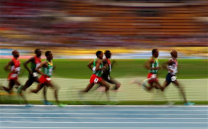 Mo Farah heads the pack in the men's 5,000 metres final at the IAAF ...