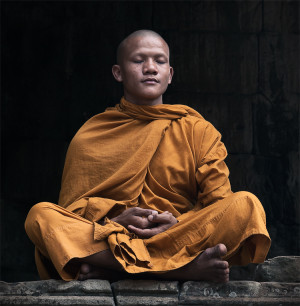 The monk, Purt, is captured deep in meditation at Angkor Wat in ...