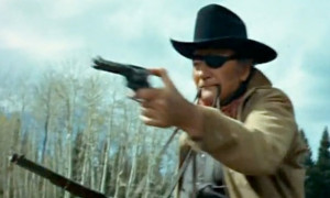 Best depiction of Rooster Cogburn firing two guns with a strap in his ...