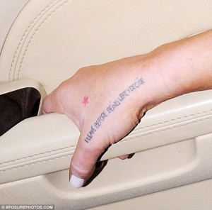 Lyndsay Lohan Unveils Cryptic Tattoos