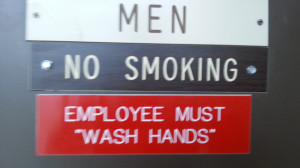 On a lavatory doorway during my job. The quotes are of some concern…