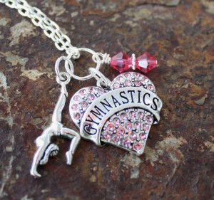 pink crystal heart with the words Gymnastics across it, a gymnastics ...