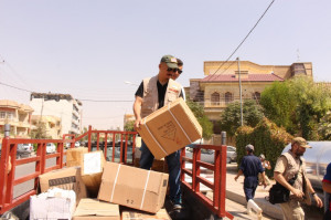 Bongo full of Humanitarian Aid supplies being unloaded by DVM D.A.R ...
