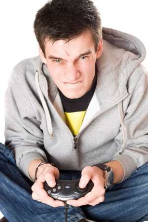 An image of a furious-looking young man on a game console.