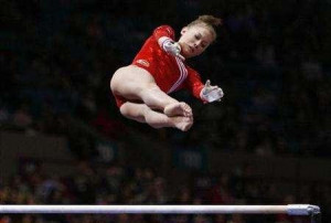 gymnast Shawn Johnson competes on the uneven parallel bars at the ...