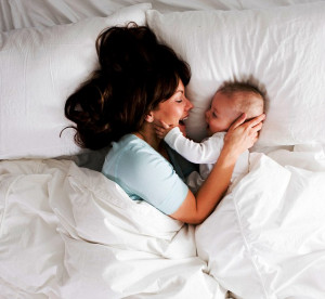 Dangerous bonding: Babies can be squashed or suffocated if they sleep ...