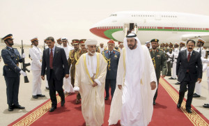 ... Khalifa bin Zayed bin Sultan al-Nahyan greeting Omani sultan Qaboos
