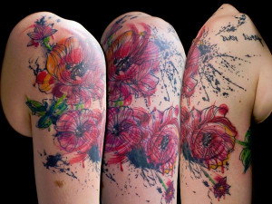 Abstract/Watercolor Flower arm tattoo