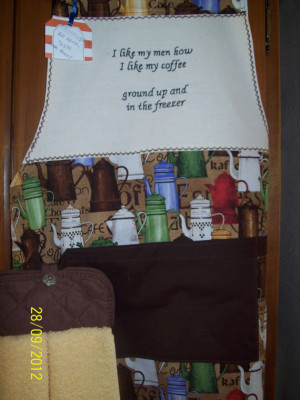 Women's cobbler style apron with coffee quotes.