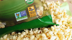 label on a bag of popcorn indicates it is a non-GMO food product, in ...
