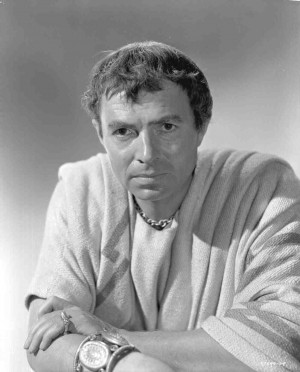 ... publicity shot of Louis Calhern as Julius Caesar sitting in chair