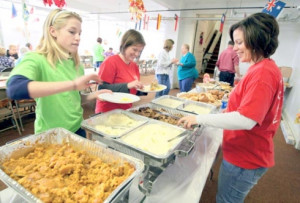 volunteers bring thanksgiving food fellowship to flood ravaged west