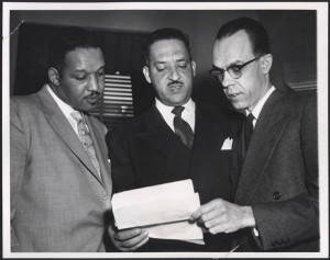 Three lawyers confer at the Supreme Court, 1953. Gelatin silver print ...