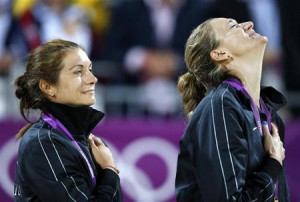 Gold medallists Misty May-Treanor of the U.S. and team mate Kerri ...