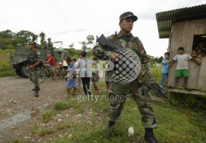 quote ecuadorean soldiers patrol the town of puerto nuevo 20 km east ...