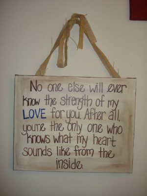 Distressed baby boy quote canvas hung with burlap