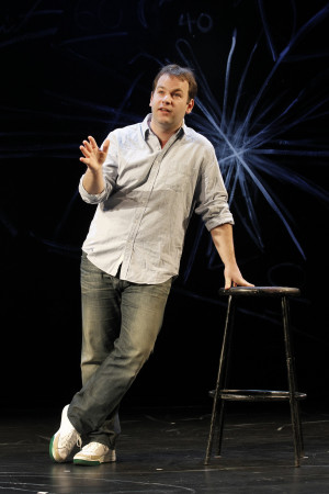 Comedian Mike Birbiglia performing 