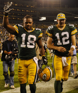 wide receiver randall cobb left and green bay packers quarterback