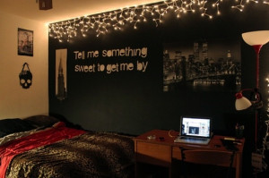 Black wall, lights and a great quote