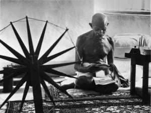 Indian Leader Mohandas Gandhi Reading as He Sits Cross Legged on Floor