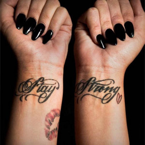 Stay strong quote wrist tattoo