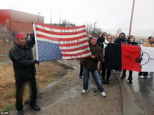 ... an upside-down American flag remembering the Wounded Knee Massacre