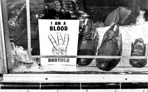 King addresses a hostile crowd during the waning hours of the riot.