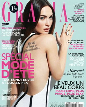 ... then: Megan Fox's back inking is airbrushed from front of magazine