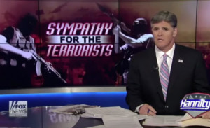 Sean Hannity sitting in front of some pretty neutral graphics Screen