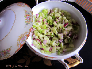 Celery, cucumber, and red onion are chopped into small bits and tossed ...