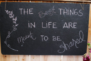 We took an old piece of wood and painted it with chalkboard paint to ...