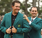Mickelson Accepts The Green Jacket from Weir