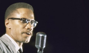 Malcolm X speaking in 1964, the year