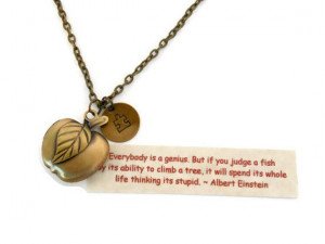 Teachers locket with inspirational quote and stamped puzzle piece ...