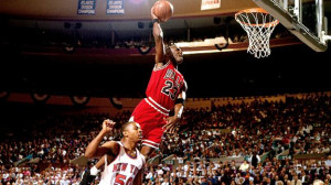 Michael Jordan dunks over Greg Anthony of the New York Knicks.