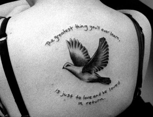 the bird of love with a cute lovey dovey quote on upper back