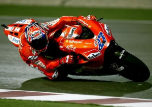 Casey Stoner will start from pole positionafter setting the fastest ...