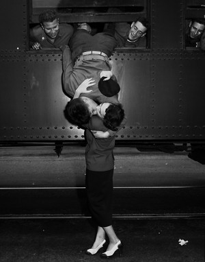 Soldiers leaning out of train windows to kiss their girls goodbye ...