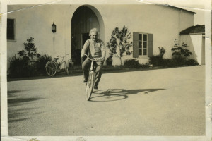 Albert Einstein riding bicycle in front of Ben Meyer's House; Santa ...